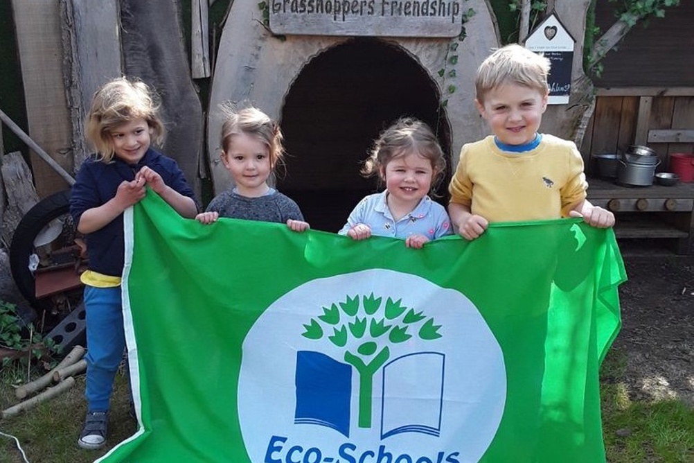 Children from Childbase Partnership's Grasshopper's nursery in St Alban's with their Eco-Schools green flag